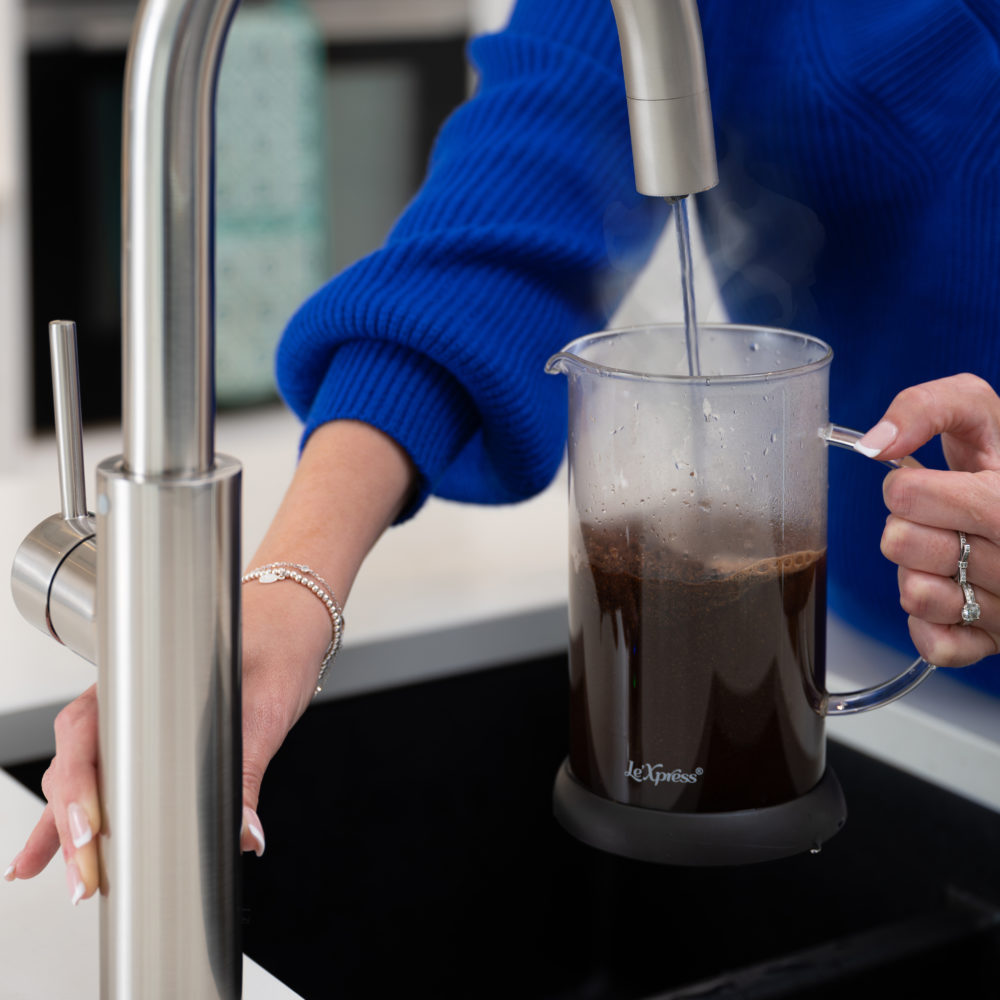 A Woman Making A Coffee