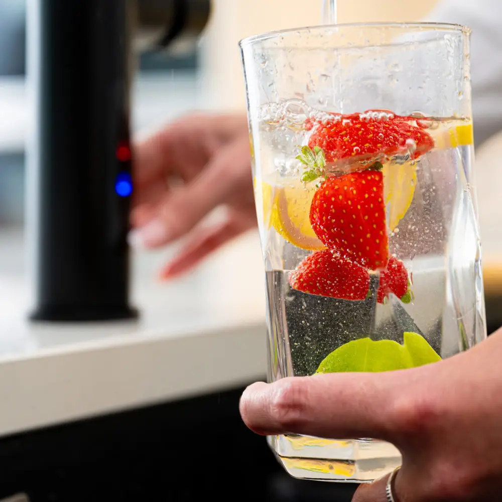 Chilled And Sparkling Water Dispensed From Faucet